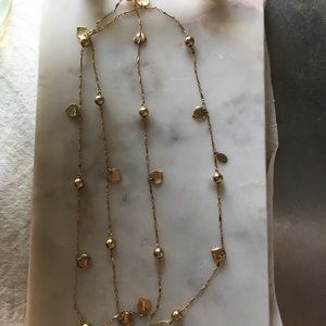 Express Long gold necklace with leaves